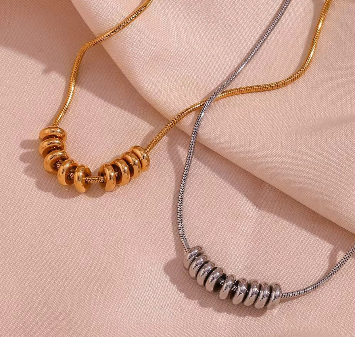 ID:0031_C | Colgante de anillos