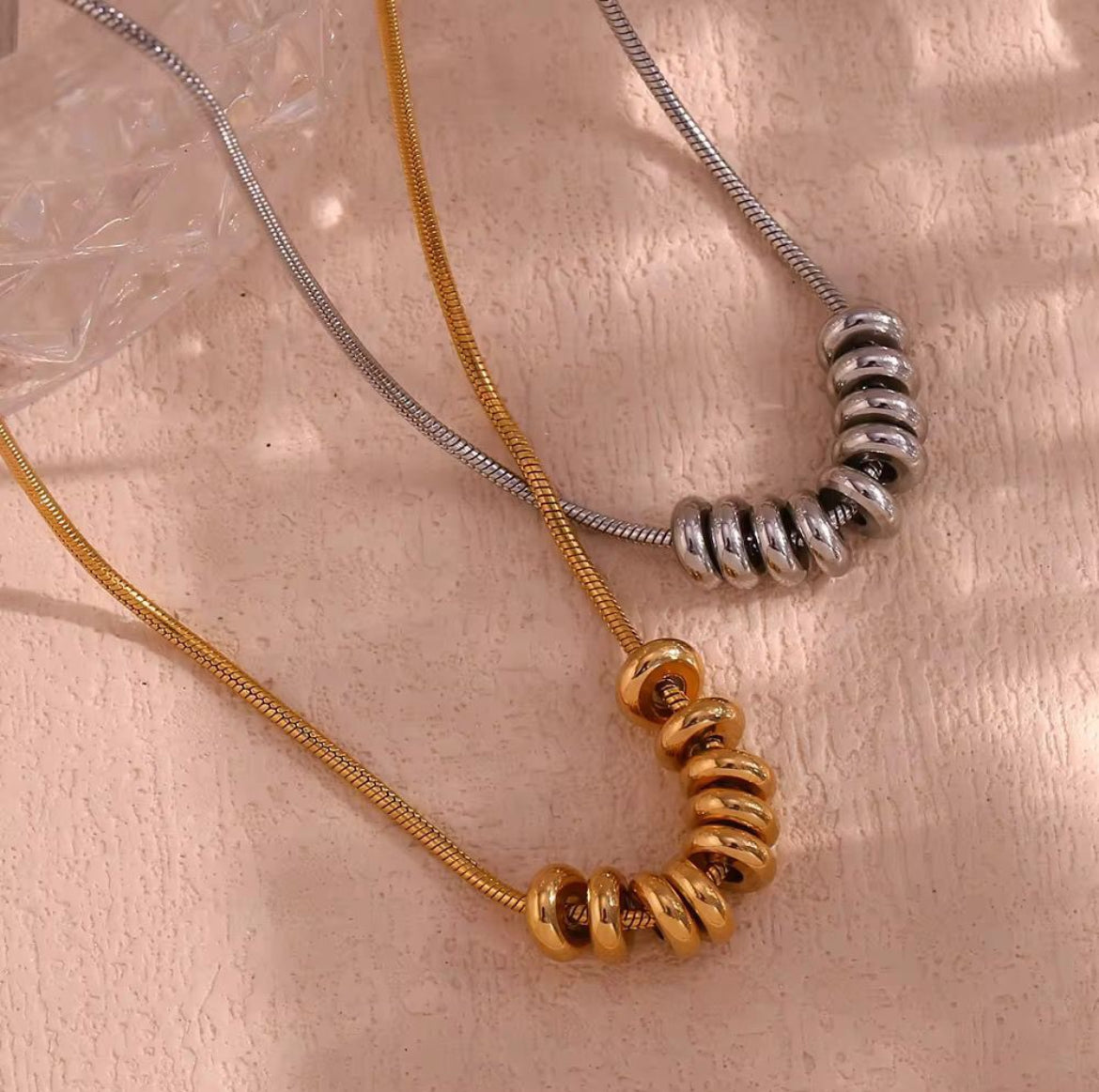 ID:0031_C | Colgante de anillos