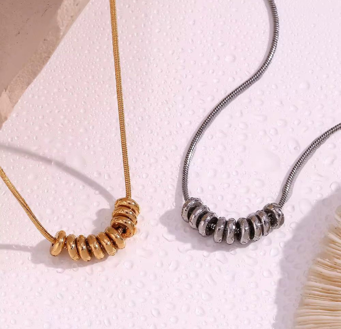 ID:0031_C | Colgante de anillos
