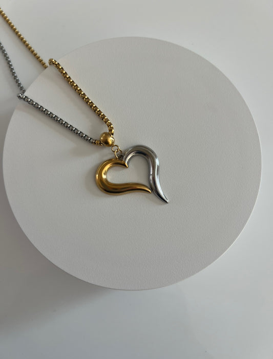 ID:0014_C | Collar de corazón dorado y plata