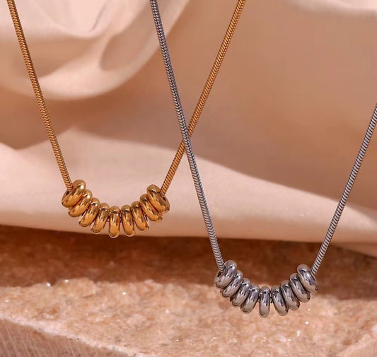 ID:0031_C | Colgante de anillos