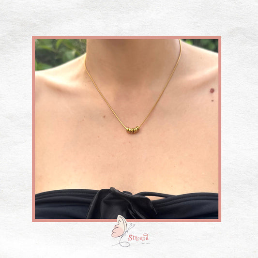 ID:0031_C | Colgante de anillos