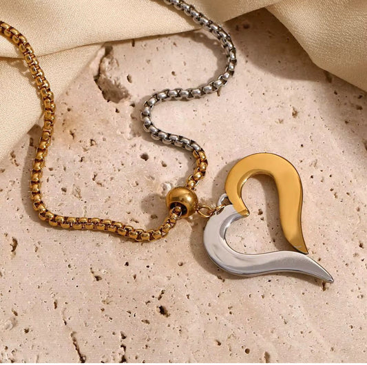 ID:0014_C | Collar de corazón dorado y plata
