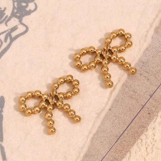 ID:0002_A | Aretes de lazitos doradas