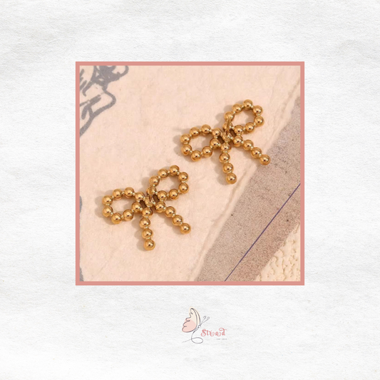 ID:0002_A | Aretes de lazitos doradas